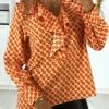 Blouse à Motif Orange Avec Volant à L'avant